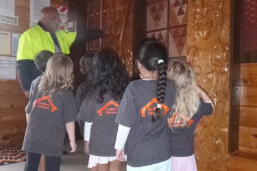 Pāpā Bob shares pūrākau, stories in the marae wharenui.