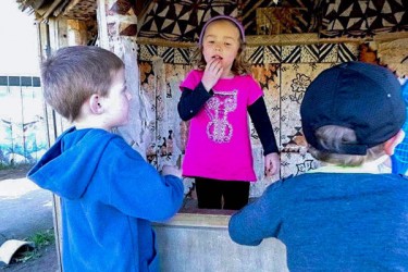 Children learning sign language. 