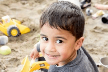 Child at Te Aroha Noa Early Childhood Centre. 